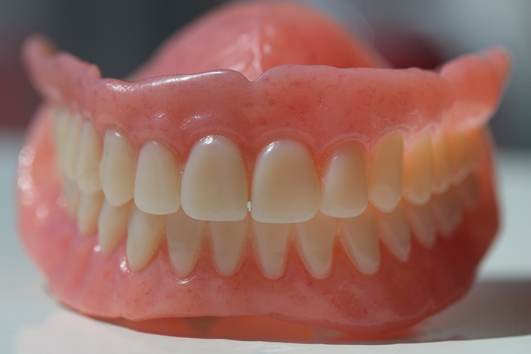 Close-up of a finished complete denture