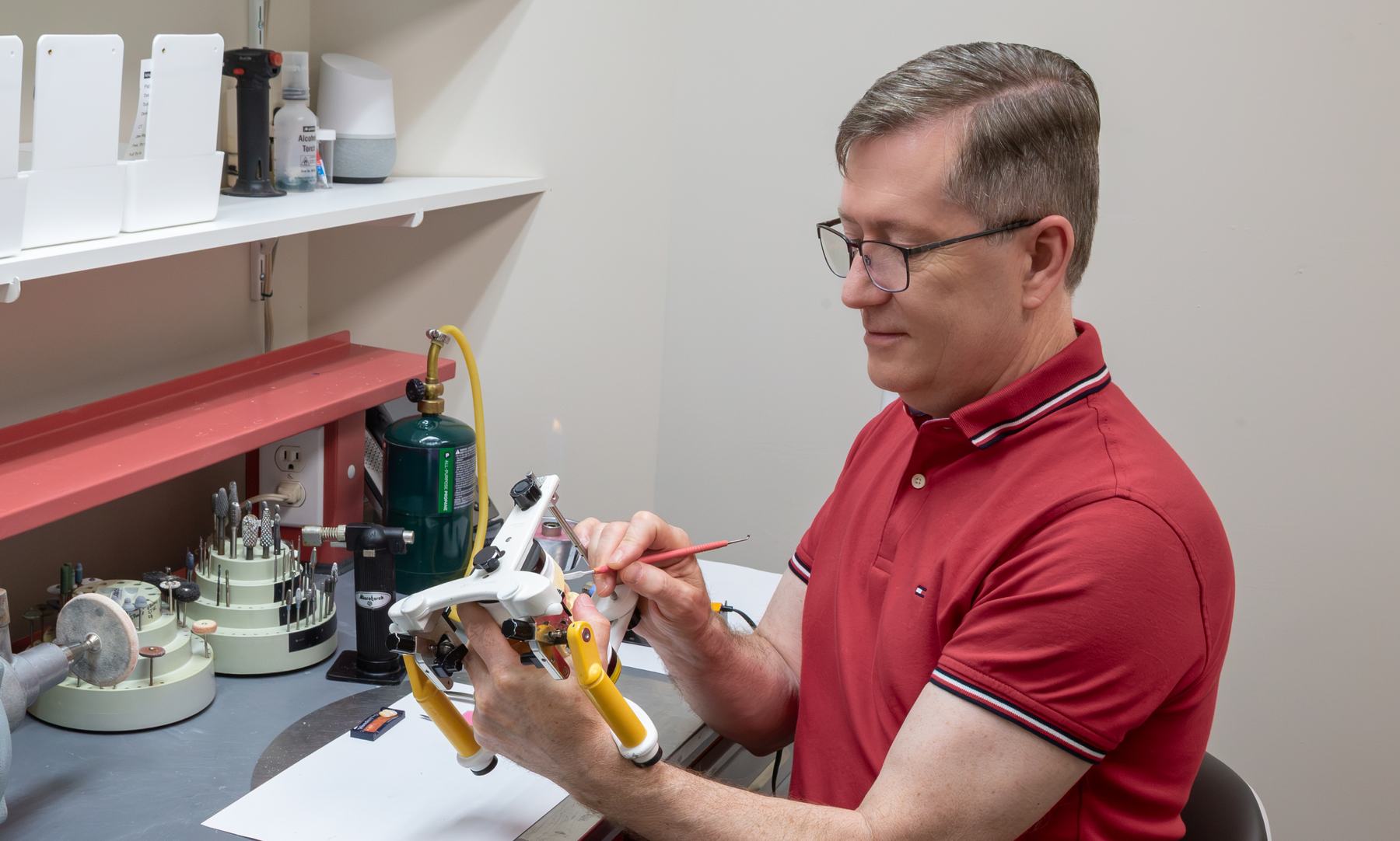 Michael Watson working by hand at the lab bench